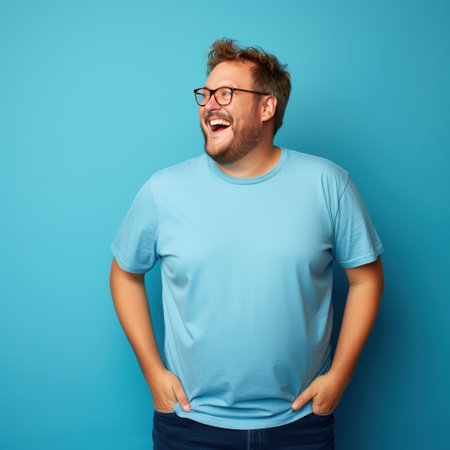 Man smiling in blue shirt on blue background isolated AIの素材