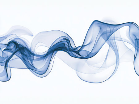 Soft tendrils of deep blue smoke rise and dance in ethereal patterns, blending into lighter hues on a pristine white backdrop, creating a mesmerizing visual experience.の素材