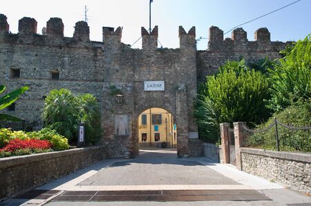 Part of the old city wall and fortress of the tourist city Lazise at lake Garda in Italy.のeditorial素材