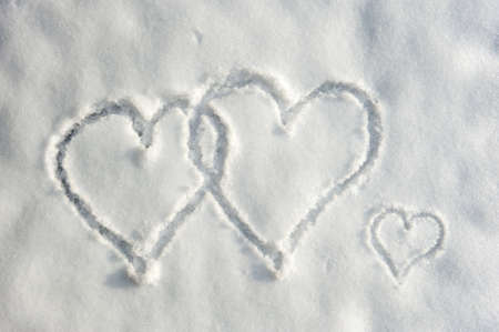 Three hearts written in the snow