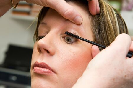 A woman s eyelash is done in a beauty salon