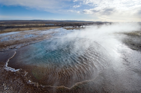 Geothermal blue hot water at the geysir destrict in Icelandの写真素材