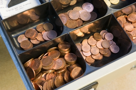 Cash money in drawer at a paydesk in a storeの写真素材