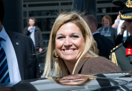 ENSCHEDE, NETHERLANDS - APR 11: Royal Highness Prinses Maxima steps into a car just after she opened a conference about micro-insurances on the University of Twente, April 11, 2012 in the Netherlandsのeditorial素材