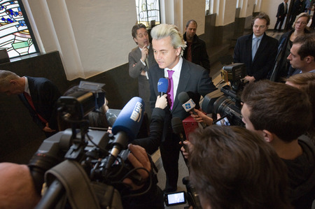 ENSCHEDE, NETHERLANDS - Jan 25  Political leader Geert Wilders of the Dutch center right party PVV surrounded by press giving an interview, January 25, 2013 in the Netherlandsのeditorial素材