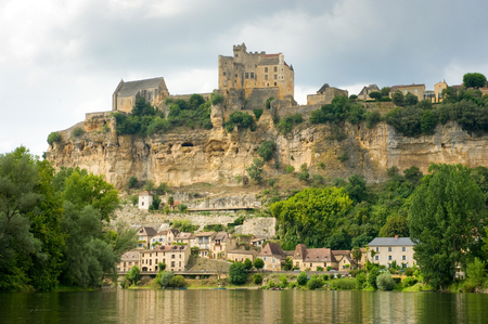 The france city of Beynac-et-Cazenac as seen from the river Dordogneのeditorial素材