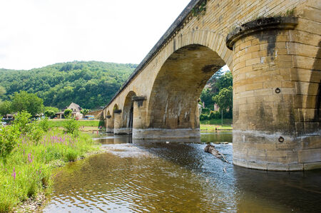 The bridge of Grolejac over the river Dordogne in Franceの写真素材