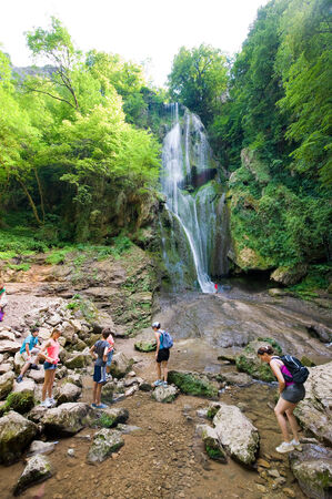 AUTOIRE, FRANCE - JULY 24  The waterfall called Cascade near the small village of Autoire in the district Dordogne in France is popular by tourists, July 24, 2014 in Franceのeditorial素材