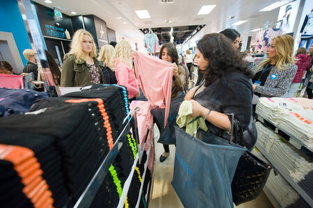 ENSCHEDE, NETHERLANDS -AUG 19, 2014: People are shopping in a new branch of warehouse Primark on the first day at the opening, August 19, 2014 in the Netherlandsのeditorial素材