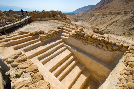 QUMRAN, ISRAEL - OCT 15, 2014: Tourists are visiting the excavations and ruins of Qumran in Israel close to the Dead Seaのeditorial素材