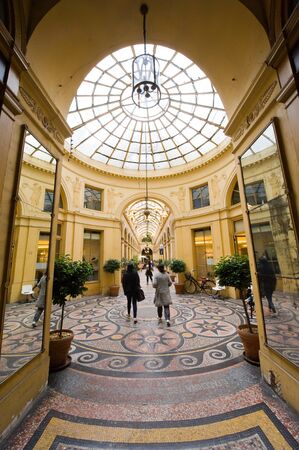 PARIS, FRANCE - JULY 27, 2015: Galerie Vivienne is an ancient historical shopping passage with shops, cafe's, and restaurants. It's one of the tourist attractions in Paris in Franceのeditorial素材