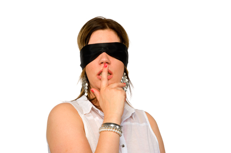 A woman with a blindfold for her eyesの写真素材