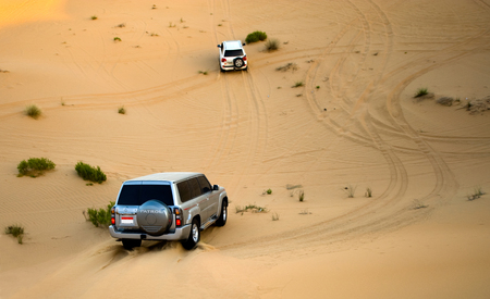 ABU DHABI, UNITED ARAB EMIRATES - DEC 30, 2017: Four wheel drive through the desert in the United Arab Emirates.のeditorial素材