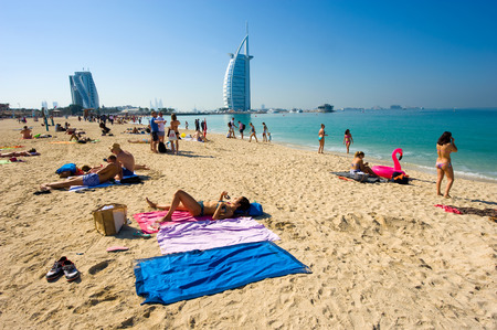 DUBAI, UNITED ARAB EMIRATES - JAN 02, 2018: Public beach of Dubai near the Burj Al Arab hotel.のeditorial素材