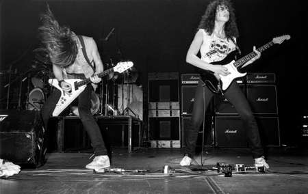 ZWOLLE, THE NETHERLANDS - FEBR 11, 1984: Metallica performing live on stage during their first concert in the Netherlands in the IJsselhal in the city Zwolle.のeditorial素材