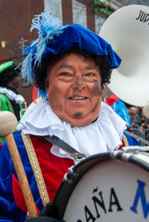 ENSCHEDE, THE NETHERLANDS - NOV 13, 2021: Black Pete is the helping hand of the Dutch Sinterklaas. Nowadays he's not completely black anymore.のeditorial素材
