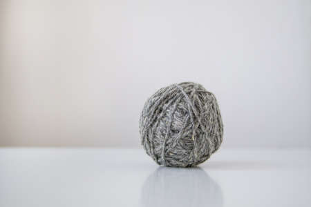 knitting on white table, one, prickly, sheep woolの写真素材