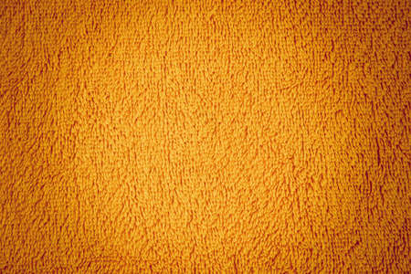 Yellow terry background with vignette.の写真素材