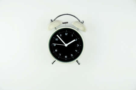 Classic watch clock, white on a white background. Isolate clock alarm.