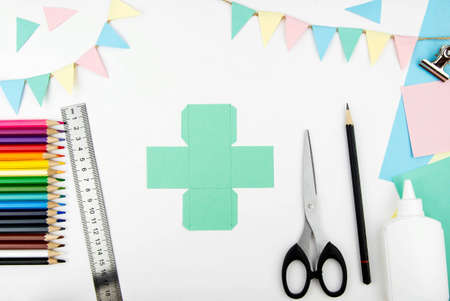 Step-by-step instructions for making a bunny box from colored paper. Step 3