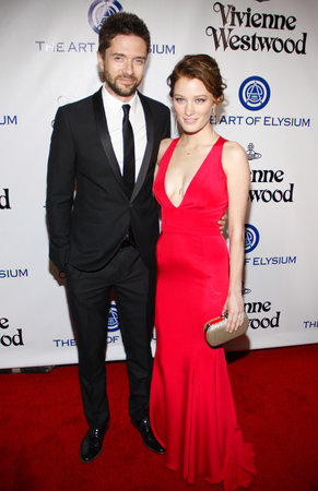 Ashley Hinshaw and Topher Grace at the Art Of Elysium's 9th Annual Heaven Gala held at the 3LABS in Culver City, USA on January 9, 2016.のeditorial素材
