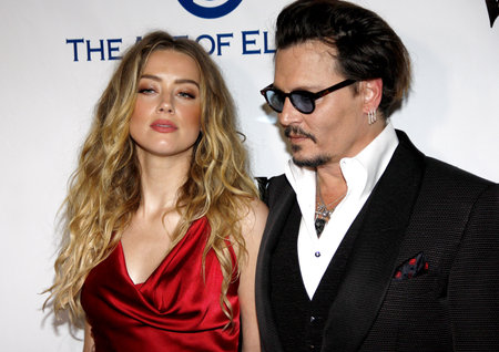 Amber Heard and Johnny Depp at the Art Of Elysium's 9th Annual Heaven Gala held at the 3LABS in...