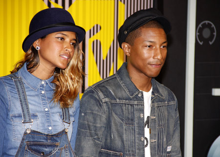 LOS ANGELES, CA - AUGUST 30, 2015: Pharrell Williams and Helen Lasichanh at the 2015 MTV Video Music Awards held at the Microsoft Theater in Los Angeles, USA on August 30, 2015.のeditorial素材