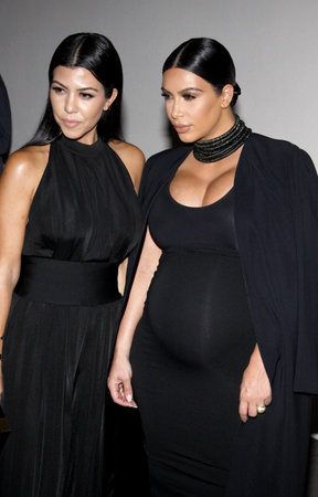 Kourtney Kardashian and Kim Kardashian at the Cosmopolitan's 50th Birthday Celebration held at the Ysabel in West Hollywood, USA on October 12, 2015.のeditorial素材