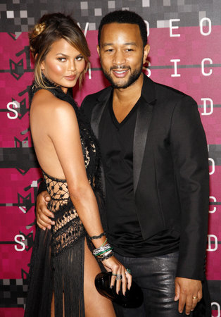 LOS ANGELES, CA - AUGUST 30, 2015: Chrissy Teigen and John Legend at the 2015 MTV Video Music Awards held at the Microsoft Theater in Los Angeles, USA on August 30, 2015.のeditorial素材