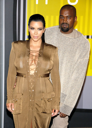 LOS ANGELES, CA - AUGUST 30, 2015: Kanye West and Kim Kardashian at the 2015 MTV Video Music Awards held at the Microsoft Theater in Los Angeles, USA on August 30, 2015.のeditorial素材