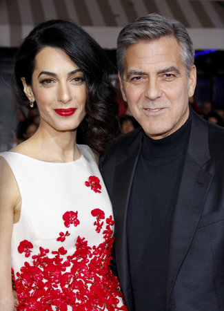 George Clooney and Amal Clooney at the World premiere of 'Hail, Caesar!' held at the Regency Village Theatre in Westwood, USA on February 1, 2016.のeditorial素材