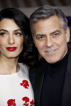 George Clooney and Amal Clooney at the World premiere of 'Hail, Caesar!' held at the Regency Village Theatre in Westwood, USA on February 1, 2016.のeditorial素材
