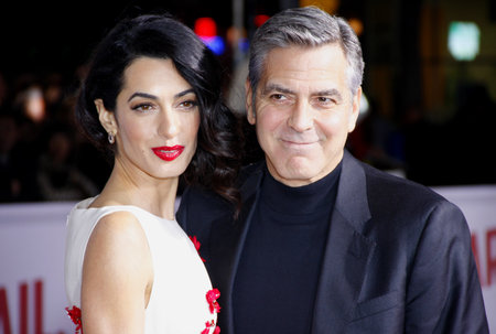 George Clooney and Amal Clooney at the World premiere of 'Hail, Caesar!' held at the Regency Village Theatre in Westwood, USA on February 1, 2016.のeditorial素材