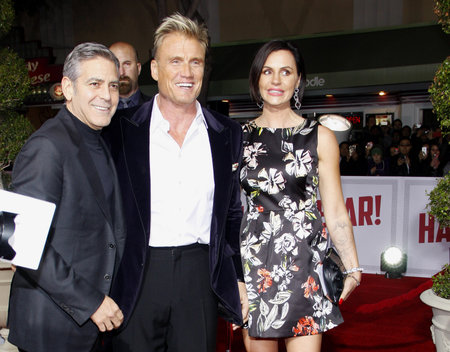 George Clooney, Dolph Lundgren and Jenny Sandersson at the World premiere of 'Hail, Caesar!' held at the Regency Village Theatre in Westwood, USA on February 1, 2016.のeditorial素材