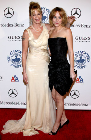 BEVERLY HILLS, CA - OCTOBER 25, 2008: Melanie Griffith and Dakota Johnson at the 30th Anniversary Carousel Of Hope Ball held at the Beverly Hilton Hotel in Beverly Hills, USA on October 25, 2008.のeditorial素材