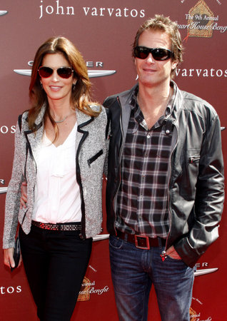Cindy Crawford and Rande Gerber at the 9th Annual John Varvatos Stuart House Benefit held at the Varvatos Store in West Hollywood on March 11, 2012.のeditorial素材
