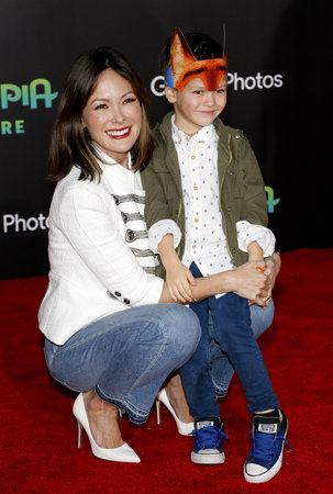 Lindsay Price and son Hudson Stone at the Los Angeles premiere of 'Zootopia' held at the El Capitan Theater in Hollywood, USA on February 17, 2016.のeditorial素材