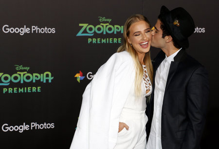 Veronica Dunne and Max Ehrich at the Los Angeles premiere of 'Zootopia' held at the El Capitan Theater in Hollywood, USA on February 17, 2016.のeditorial素材