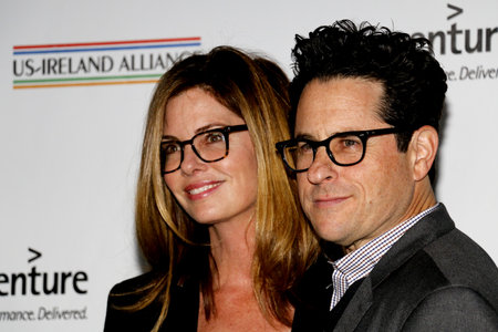 J.J. Abrams and Katie McGrath at the 2016 Oscar Wilde Awards held at the Bad Robot in Santa Monica, USA on February 25, 2016.のeditorial素材