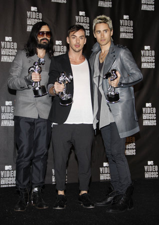 Tomo Milicevich, Shannon Leto and Jared Leto of 30 Seconds to Mars at the 2010 MTV Video Music Awards held at the Nokia Theatre L.A. Live in Los Angeles on September 12, 2010.のeditorial素材
