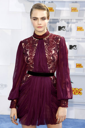 Cara Delevingne at the 2015 MTV Movie Awards held at the Nokia Theatre L.A. Live in Los Angeles, USA on April 12, 2015.のeditorial素材