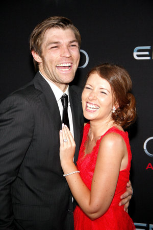 Liam McIntyre and Erin Hasan at the Los Angeles premiere of "Ender's Game" held at the TCL Chinese Theatre in Hollywood, USA on October 28, 2013.のeditorial素材