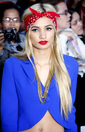 Pia Mia at the Los Angeles premiere of "Divergent" held at the Regency Bruin Theatre in Westwood, USA on March 18, 2014.のeditorial素材