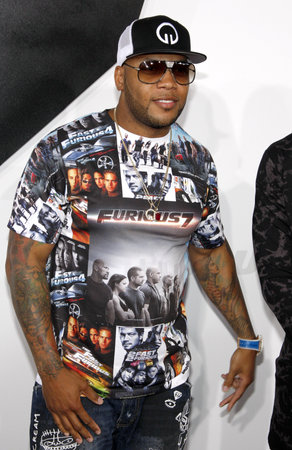 Flo Rida at the Los Angeles premiere of 'Furious 7' held at the TCL Chinese Theater in Hollywood, USA on April 1, 2015.のeditorial素材