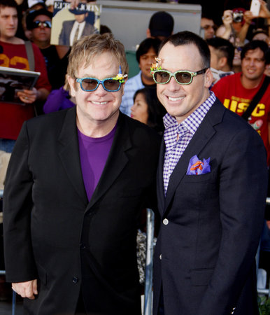 Elton John and David Furnish at the Los Angeles premiere of 'Gnomeo And Juliet' held at the El Capitan Theater in Hollywood on January 23, 2011.のeditorial素材