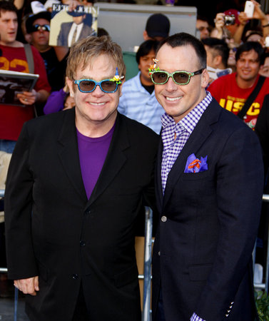 Elton John and David Furnish at the Los Angeles premiere of 'Gnomeo And Juliet' held at the El Capitan Theater in Hollywood on January 23, 2011.のeditorial素材