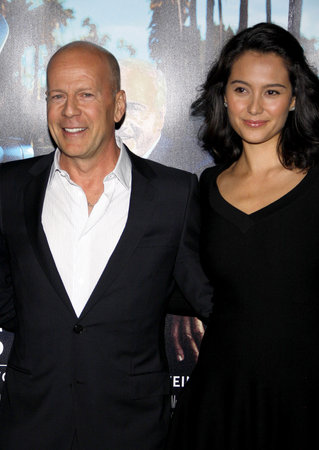 Bruce Willis and Emma Heming at the HBO's 'His Way' Los Angeles Premiere held at the Paramount Studios lot in Hollywood on March 22, 2011.のeditorial素材