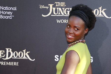 Lupita Nyong'o at the World premiere of 'The Jungle Book' held at the El Capitan Theatre in Hollywood, USA on April 4, 2016.のeditorial素材