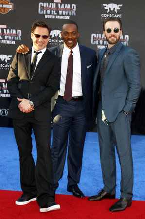 Robert Downey Jr., Anthony Mackie and Chris Evans at the World premiere of 'Captain America: Civil War' held at the Dolby Theatre in Hollywood, USA on April 12, 2016.のeditorial素材