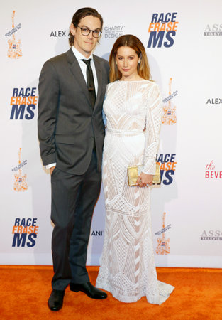 Christopher French and Ashley Tisdale at the 23rd Annual Race To Erase MS Gala held at the Beverly Hilton Hotel in Beverly Hills, USA on April 15, 2016.のeditorial素材